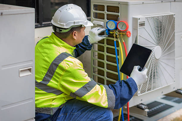Professional Air Duct Cleaning technician working in Llano, TX